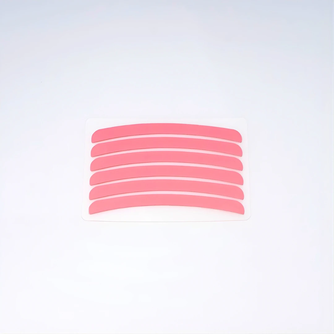 Lash-Lift-Compensators-–-Silicone-Lockers-Ταινίες-Σταθεροποίησης-Pink Σετ από 6 ροζ ταινίες σιλικόνης (Lash Lift Compensators) της Addictive Lashes. Χρησιμοποιούνται ως lockers πάνω στα ρολάκια για την απόλυτη σταθεροποίηση των βλεφαρίδων κατά την επεξεργασία, αντικαθιστώντας την κλασική πλαστική μεμβράνη (film).